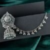 Oxidized Silver Floral Motif Jhumka Earrings with Chain Extension - Image 2