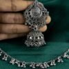 Oxidized Silver Floral Motif Jhumka Earrings with Chain Extension - Image 3